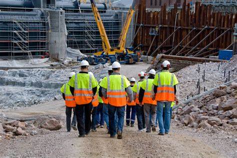 workers getting ready to start their work at a construction site